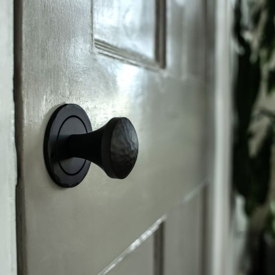 Iron Art Double Hammered Knob with Round Rose Passage Set