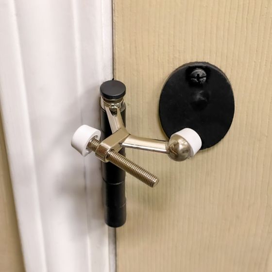 Hinge mounted door stop